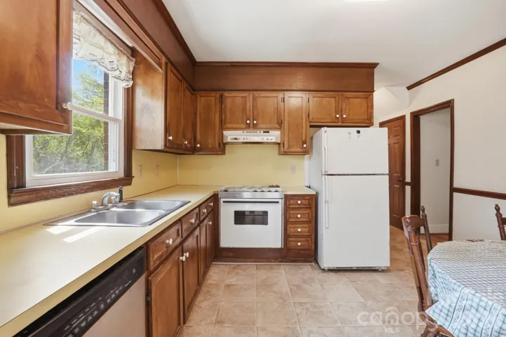 Eat-In Kitchen with window overlooking patio and backyard