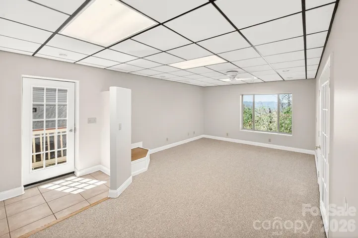 Lowest level living room with outside private access if needed. 