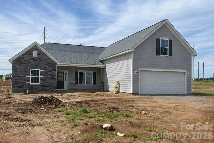 New 4 BR 3 1/2 BA Ranch on 1/3 Acre.