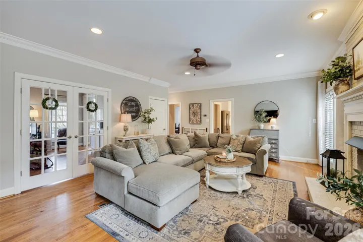 Private office located behind a set of french doors behind living room.