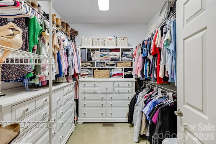 Primary bedroom walk in closet, just one of three in the primary.