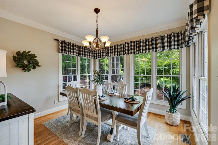 All seasons sunny breakfast spot off kitchen with access to the deck and overlooking the private yard.