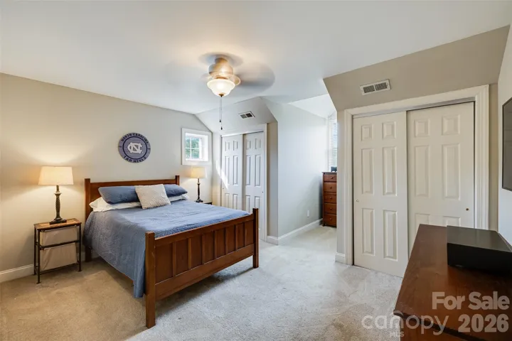 Secondary bedroom #1 upstairs.  So much storage in these large bedrooms.