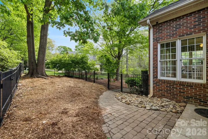 Dog run area, fenced separately from rest of backyard. 