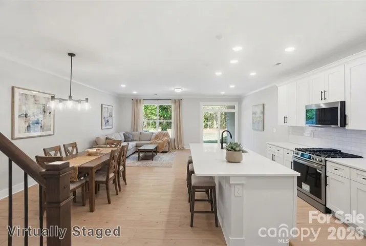 Virtually staged kitchen and family room