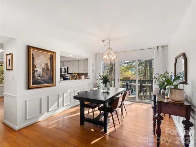 Large eat in dining area facing back deck and view.