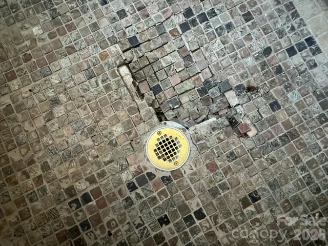 Damaged shower floor