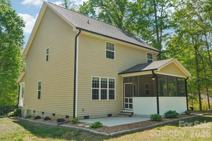 Back patio and screened deck