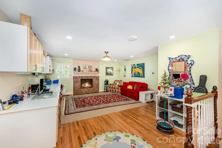 On the second floor, there is an open space with built-instorage and desks. So many options!