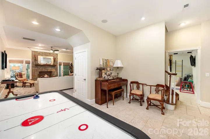 The basement is HUGE and could be a second living quarters! The area at the bottom of the stairs makes a great spot for a game room.