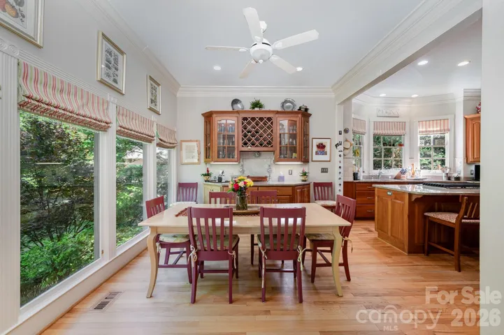 The breakfast area is surrounded by lots of natural light.