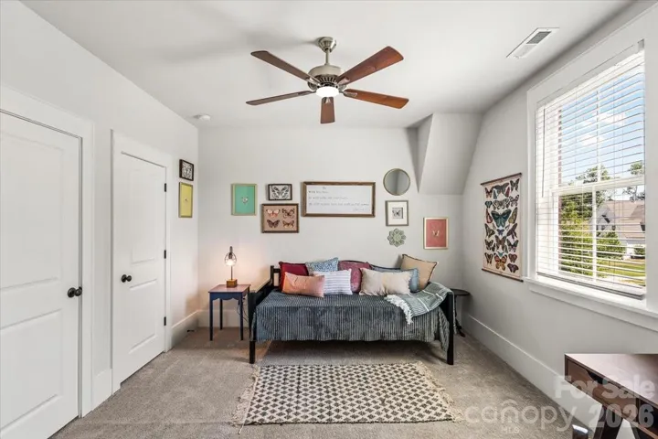 Generously sized upper bedroom... bright, restful, and ready for any style