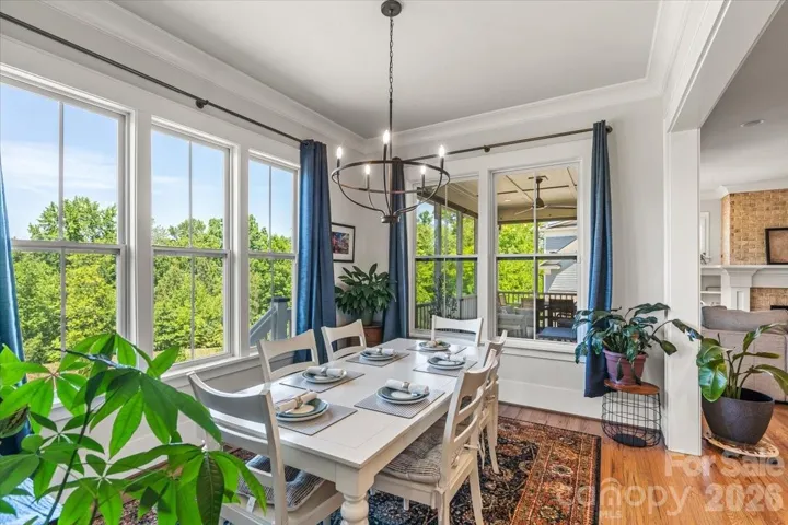 Spacious dining area overlooks the private back yard... morning coffee meets golden hour