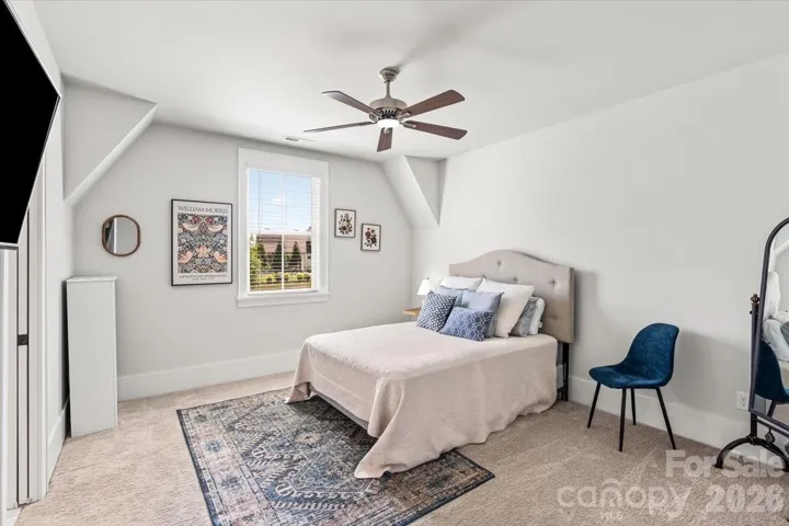 An upper bedroom with personality... with a large walk-in closet and plenty of natural light