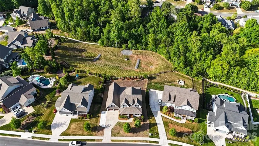 Aerial view of 559 Preservation Drive on its private, beautifully landscaped lot