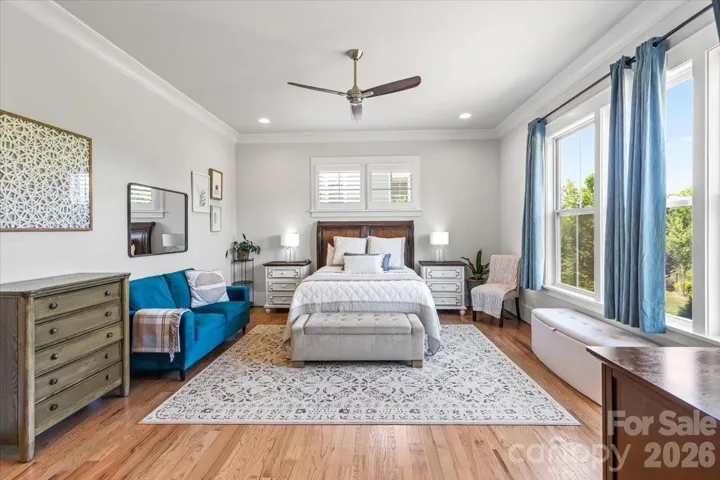 Primary suite on main... spacious, light-filled, and designed for true living with thoughtful separation of space