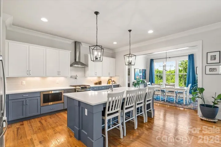 Chef's kitchen anchored by an oversized island... built for gathering as much as cooking