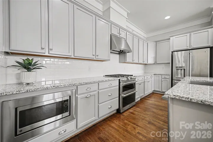 Double ovens, gas range, microwave and counter-depth refrigerator