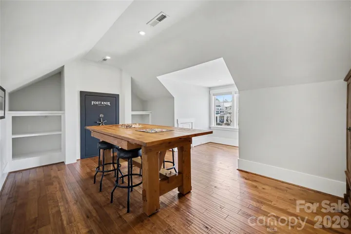 Built-in Fort Knox Defender 7241 safe, custom shelves and reading nook in bedroom #4/bonus room