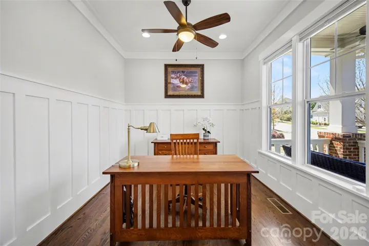 Work from home with ease in the light and bright home office with custom trim