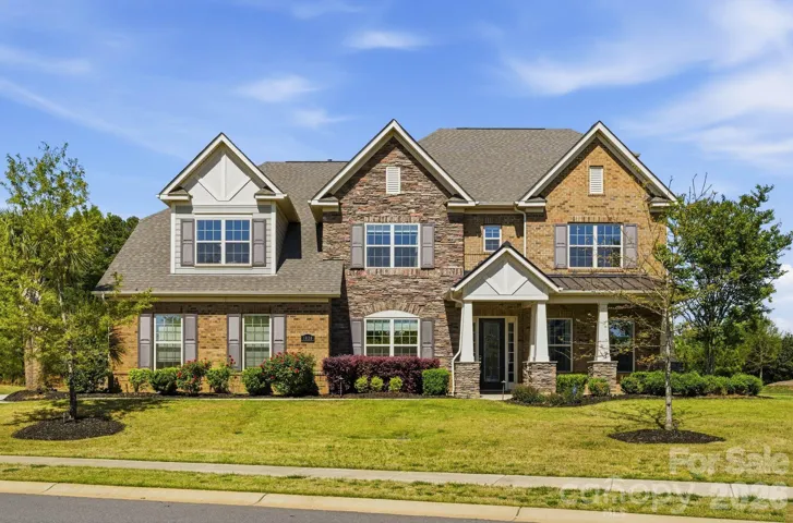 Gorgeous curb appeal in Weddington in award winning school district.