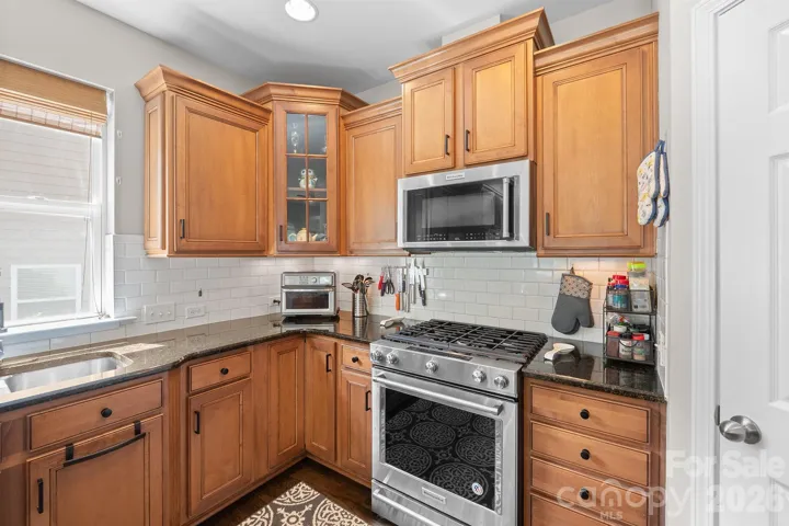Gas Range, Walk-In Pantry and plenty of counter for prep work.