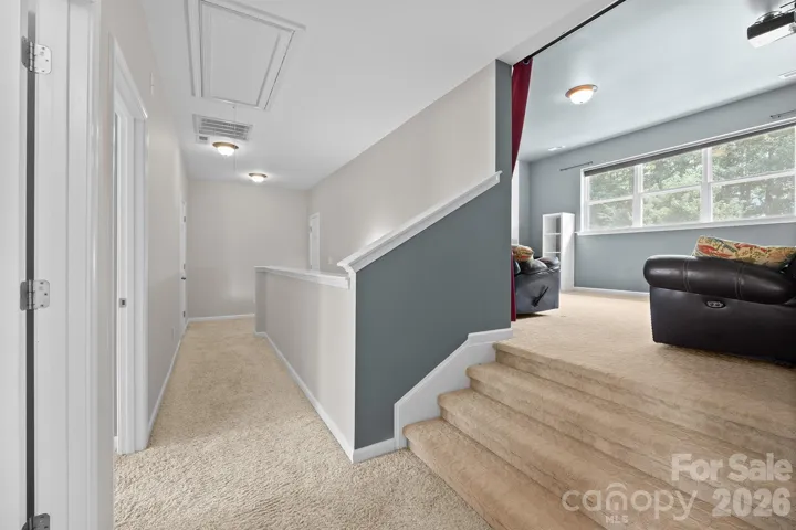 Raised Media/Theatre Room with projector, wall screen and surround sound. 