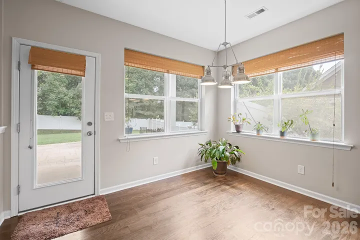 Breakfast Area with access to covered rear porch and patio.