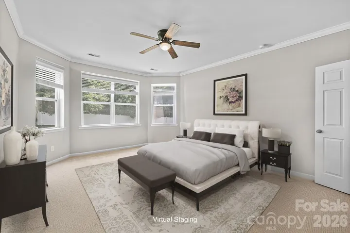 Primary Suite with bay window seating area.