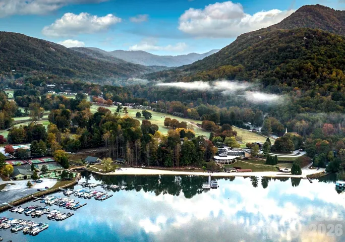 Rare to find a home in Lake Lure in a private gated resort with lake, golf and SO MANY club amenities - See Rumbling Bald Resort site - it’s impressive. This is a photo from their site.