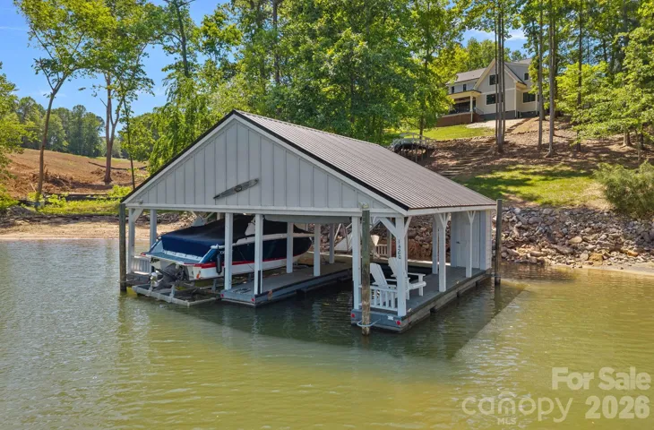 Your own covered boathouse with two slips. 