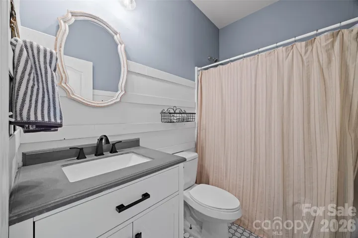 Main level full bathroom- guests can have a space of their own! 