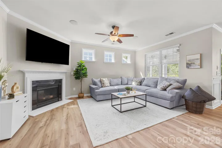 Large family room w/ fireplace - perfect for entertaining or movie night! 