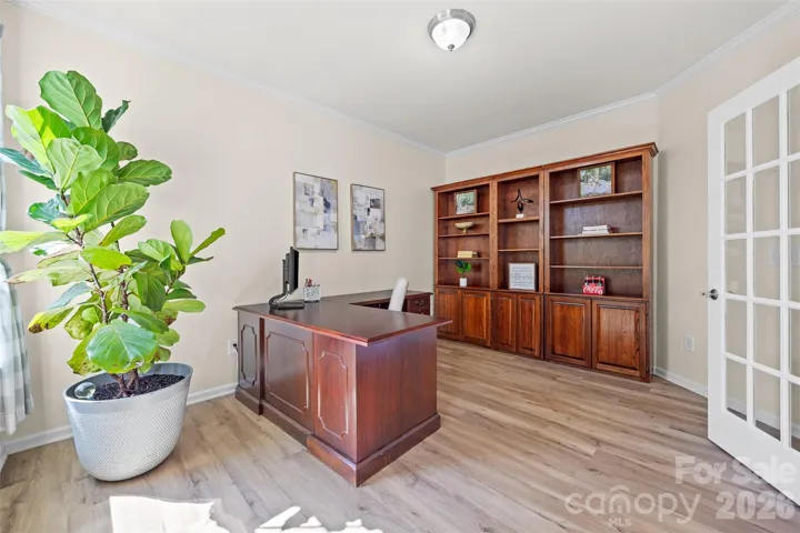 Spacious office w/ French doors to left of entry