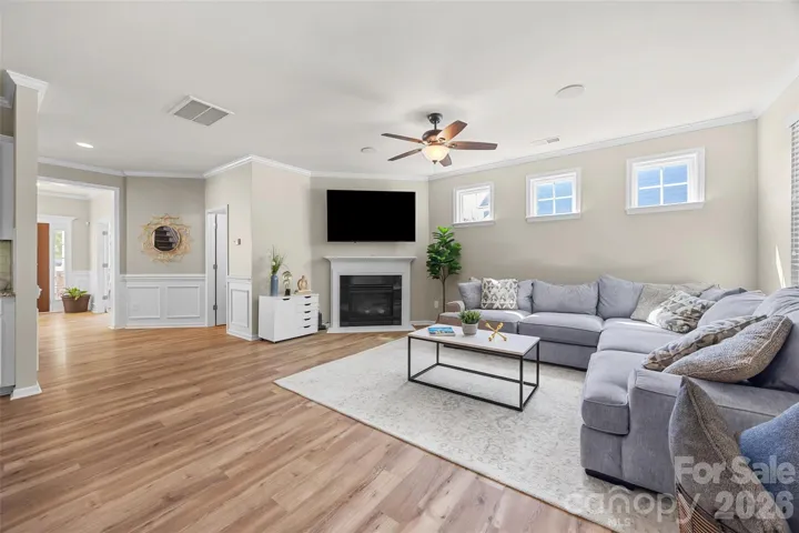 Large family room w/ fireplace - perfect for entertaining or movie night! 