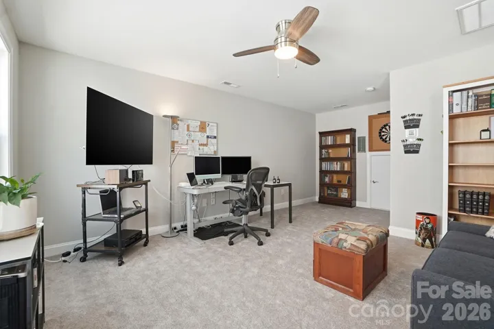 Spacious bonus room / 3rd bedroom (per Kolter Homes) ideal for a guest suite, media room, or additional living area.