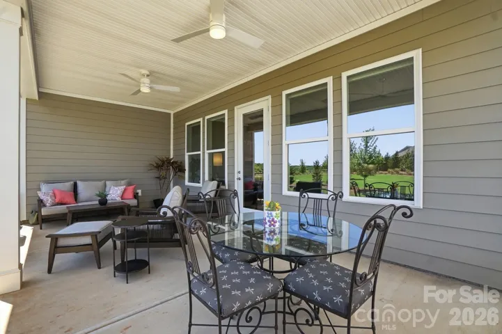 Enjoy eating outside under this large covered porch.