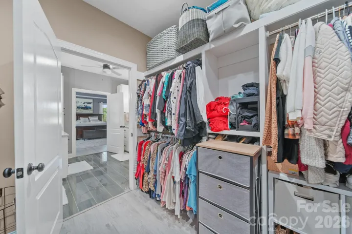 Primary Closet with built ins.