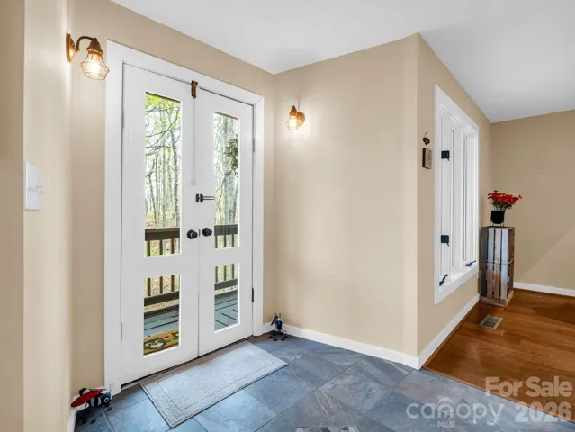 Double door to outside screened porch