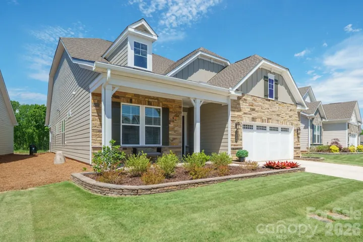 Covered Porch + 2 Car Garage