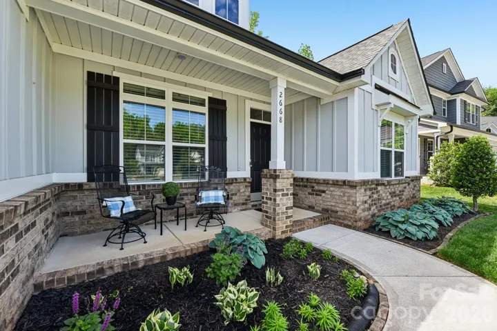 Beautiful landscaping and covered front porch