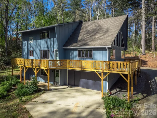 Side view of deck and wrap around driveway.