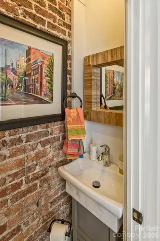 Half bath in hallway 