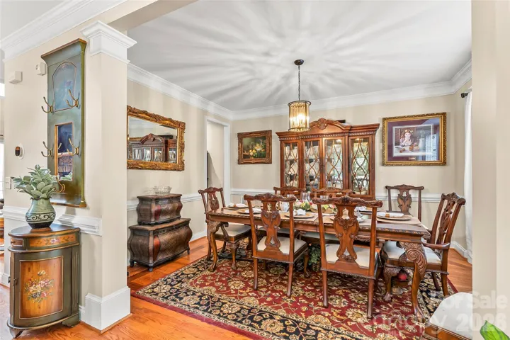 Beautiful dining room with chair rail and nice moldings.
