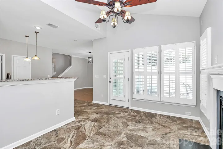 FAMILY ROOM WITH VIEW OF PATIO