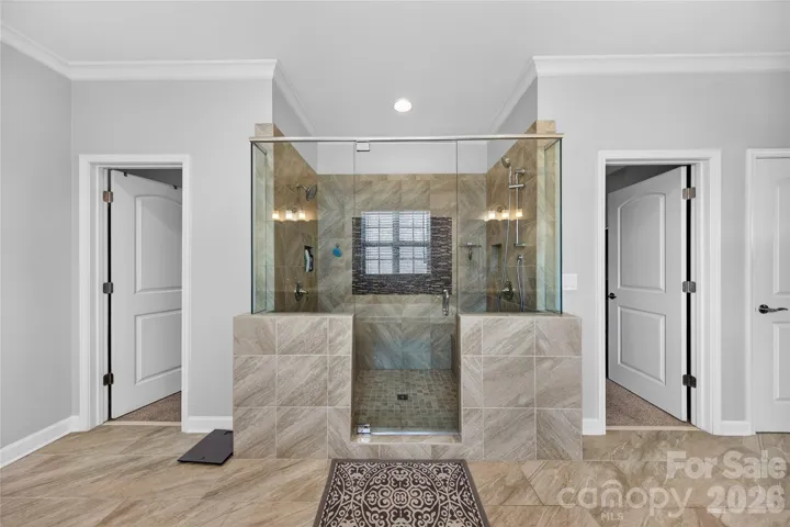 Walk Through Walk-In Closet & Double Shower