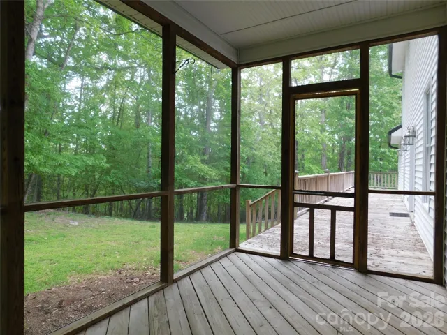 Screened-in porch just off kitchen.