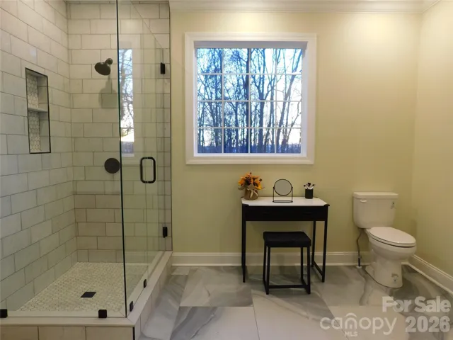 Large window allows for natural light.