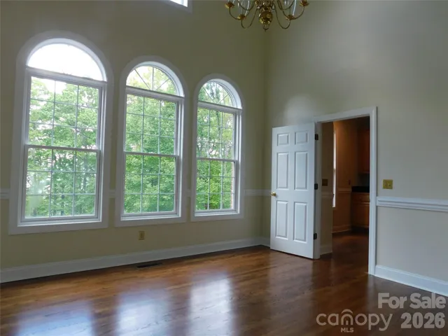 Dining Room is bathed in natural light with gorgeous custom windows.