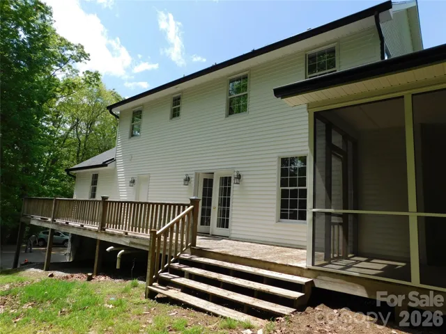 Open back deck.  Possible for drive to extend to this entrace.